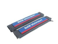 T#340352 - MSBELT50MM - BMW Motorsport Seat Belt Shoulder Pad Set - These original BMW Motorsport shoulder pads fit over any street car seat belt or 2" harness belt. A zippered side makes these super easy to install on any car. High quality "BMW MOTORSPORT" embroidery will set your car apart from the rest. Also available in 76mm (3") harness width. Set includes two shoulder pads. - Genuine BMW - BMW